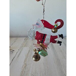 Silvestri Santa fanciful flights ornament Karen rossi Xmas vintage packages bell